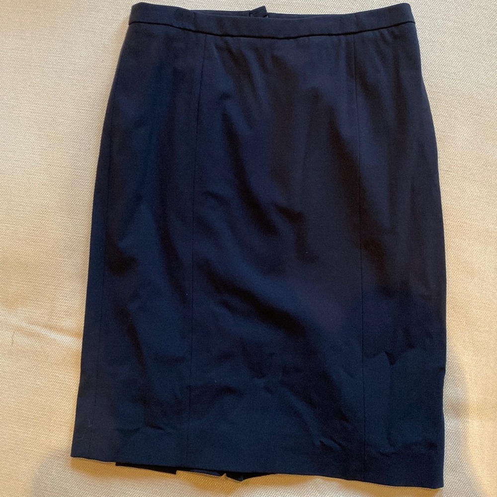 Black stretch wool Armani skirt with pleat details in the back